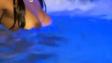 busty indian babe in water