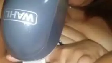 Kinky college girl satisfies her pussy with a big vibrator