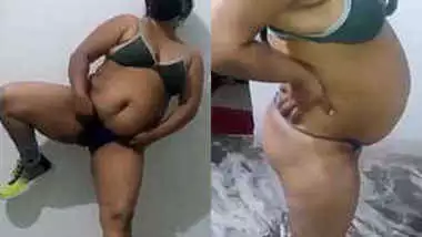 Fatty Indian woman wearing black mask demonstrates porn skills