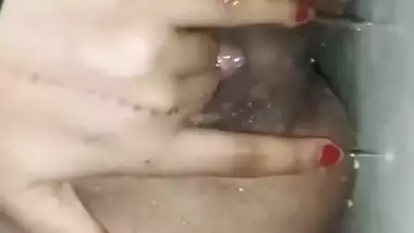 Horny bhabhi masturbating and squirting in bathroom, husband recording