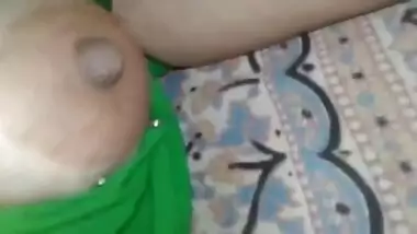 Naughty boy manages to film XXX breast of sleeping Desi girlfriend