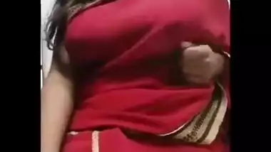 In this sex clip Desi hottie flashes juicy XXX melons while smoking