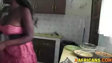 Busty African chick banged by white rod in kitchen