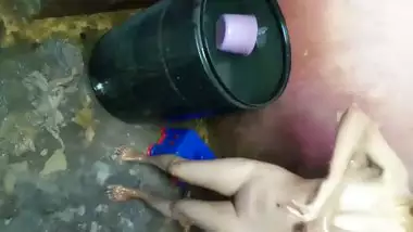 Slim figured Indian girl making her bathing selfie