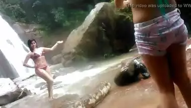 Indian bikini girls having fun in the waterfalls