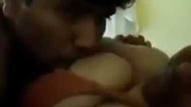 Desi MILF rests with husband with sex lover kissing her XXX titties