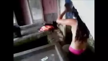 Woman washes her sex body wearing only XXX bra and panties on camera