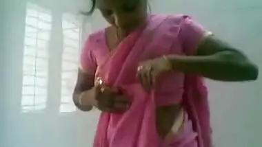 housewife in pink sari stripping naked