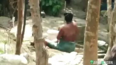 Indian busty aunty taking bath outdoor full nude, caught hidden cam