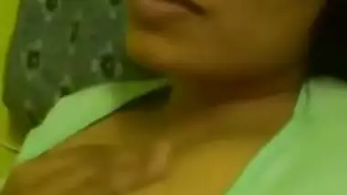 desi mom pulls green T-shirt down and flashes dark nipples in sex show