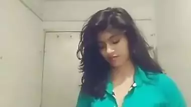 Indian teen unbuttons green shirt and takes it off just like her bra