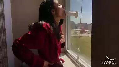 HOME ALONE HORNY DESI SLUT SUCKS AND FUCKS DILDO ON WINDOW