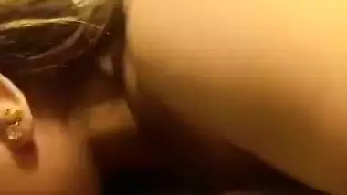 Lady gives an Indian blowjob to her lover in bed