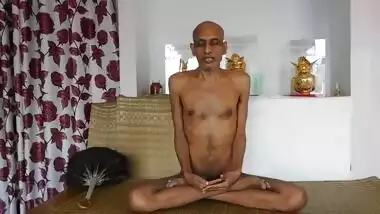Beautiful holy naked Indian man teaching meditation