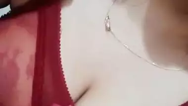 Sexy cute girl shows her big round boobs