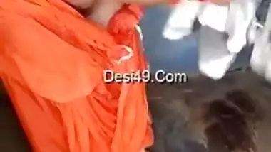 Husband films amateur porn video of the Desi wife in orange dress