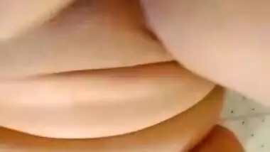 Busty chubby beauty fingering pussy