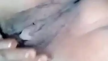 Small-tittied Desi girl with nose piercing likes to film porn videos