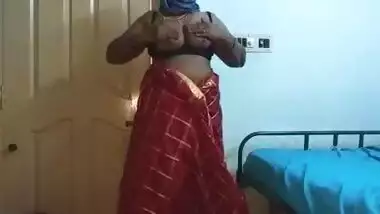 desi indian tamil telugu kannada malayalam hindi horny cheating wife vanitha wearing cherry red colour saree showing big boobs and shaved pussy press