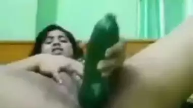 Indian girl masturbating with cucumber