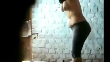 Hidden camera records bhabhi taking a bath in her bathroom