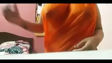 Desi horny girl showing and playing her big boobs in yellow saree