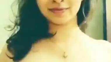 Hot desi girl pressing her boobs