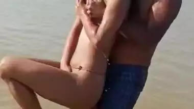 Enjoying with busty Desi slut in river