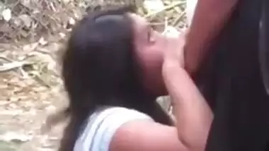 Young Indian college girl giving blowjob to uncle outdoor, new Desi viral mms