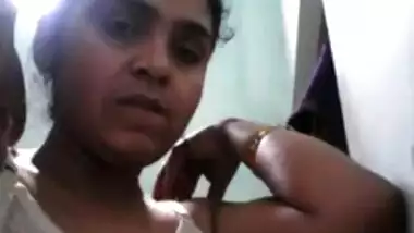 Desi female takes bra down showing off XXX boobs with dark sex nipples