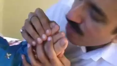 Mustached Indian man worships feet of girl in blue dress in XXX video