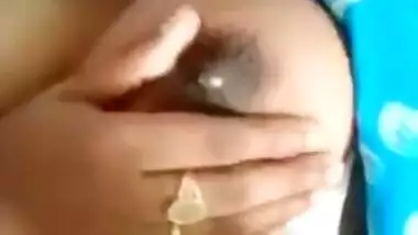 Desi Bhabhi's milking tits exposed in the close-up self-made XXX video
