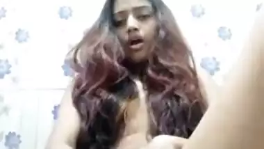 Cute Indian XXX girl moaning hard while dildoing her pussy