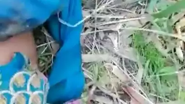 Cute village girl in fields