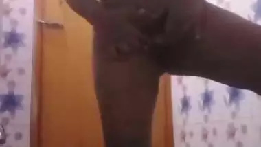 Bhabhi in bathroom baths and fingers cunt in horny mood