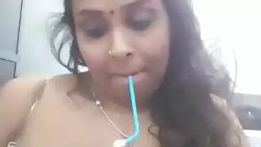 Booby Bhabhi smoking hookah and exposing her topless body