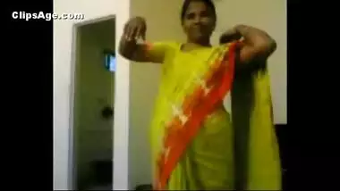 Aunty stripping cloths in free porn tube video