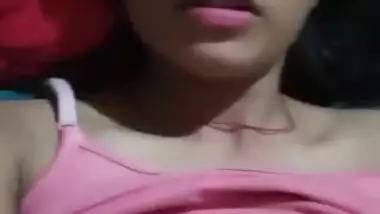 Cute girl shows her boobs and pussy