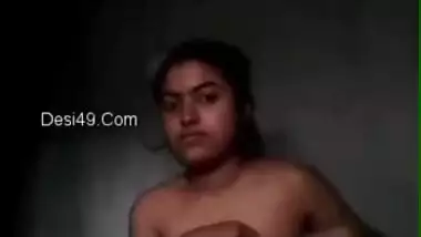 Desi teen takes off dress and puts it on during webcam video