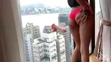 NAUGHTY DESI COLLEGE TEEN RIDES DILDO AGAINST HONG KONG SKYSCRAPER WINDOW