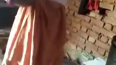 Desi Village Bhabhi Wearing Clothes While Hubby Recording