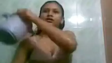 Indian teen takes a shower and gets dressed.