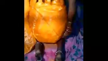 Village ass fucks an orange dildo