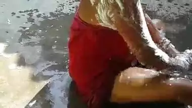 Indian Bhabhi Taking A Nice Open Bath