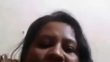 Desi mom simply sits in front of camera and talks with serious face