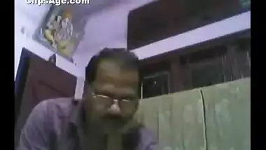 Bank manager working in Assam sucking boobs of his wife on webcam