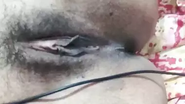 Indian fingering girl showing hairy pussy