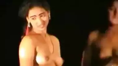 Indian strippers showing off their shaven twats.