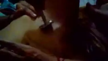 Two Lesbians shaving the pussy