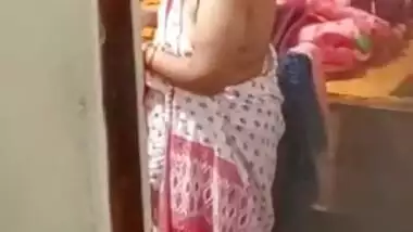Aunty caught on hidden cam while dressing video